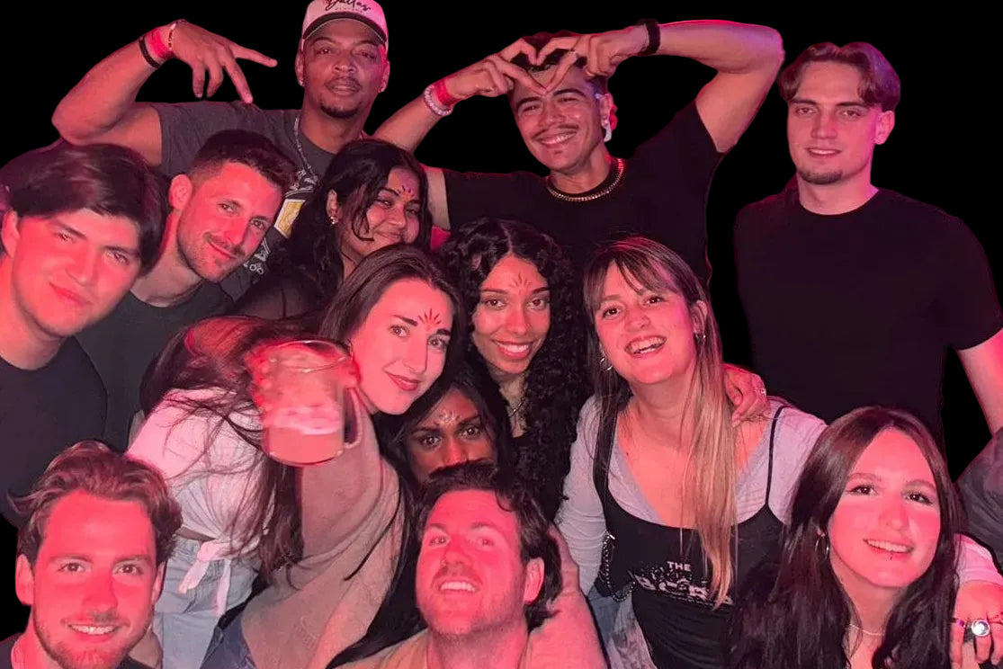 International travelers enjoying a social nightlife experience in Madrid with The Pub Crawl Company
